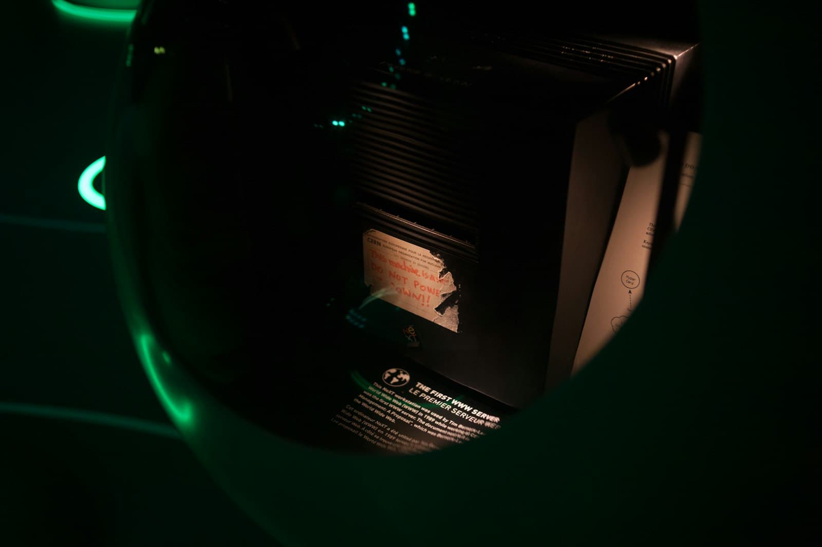 A dark server corridor, where the quiet part of the risk lives